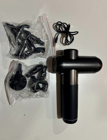 Pistola de masaje con maletín + cabezales