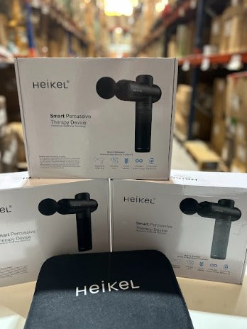 Pistola de masaje con maletín + cabezales